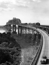 The massive Mississippi River bridge carrying rail and auto traffic.  The bridge was named after Huey P. Long following his assassination.